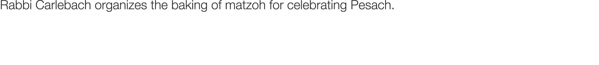 Rabbi Carlebach organizes the baking of matzoh for celebrating Pesach.